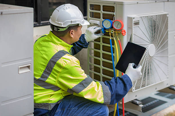 Professional Heat Pump Repair technician working in Sparrow Bush, NY